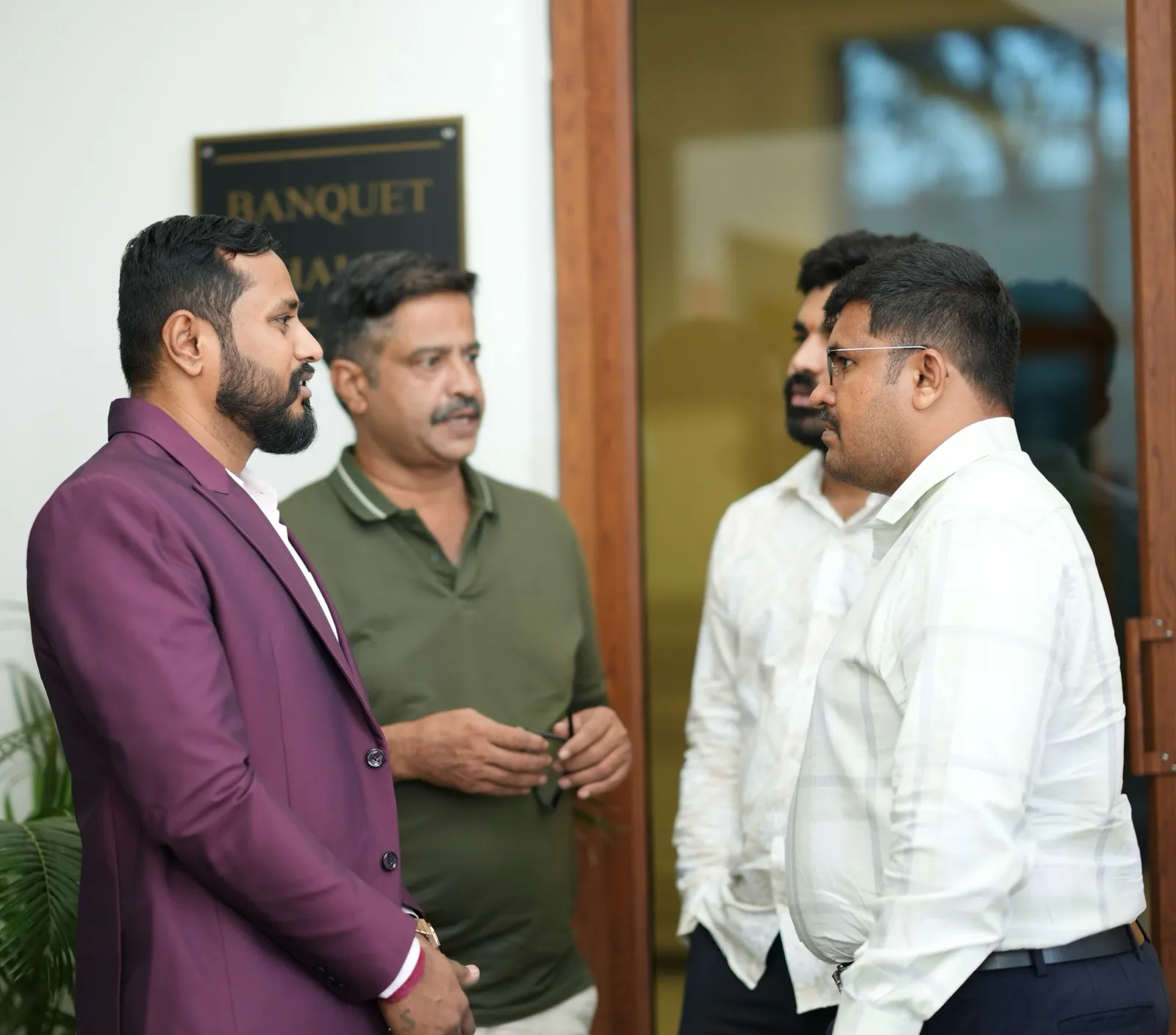Guests in conversation, Mandya